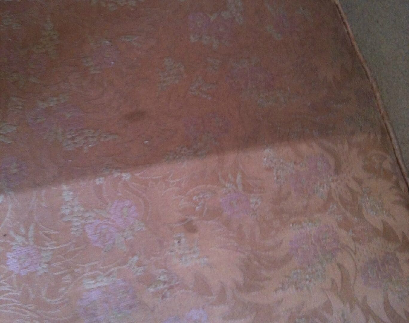 A carpet with some flowers on it