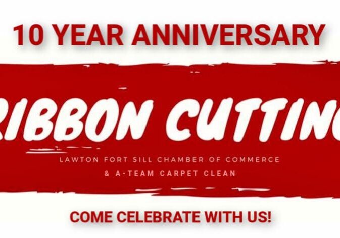 A red banner with the words " 1 year anniversary carbon cutter " on it.