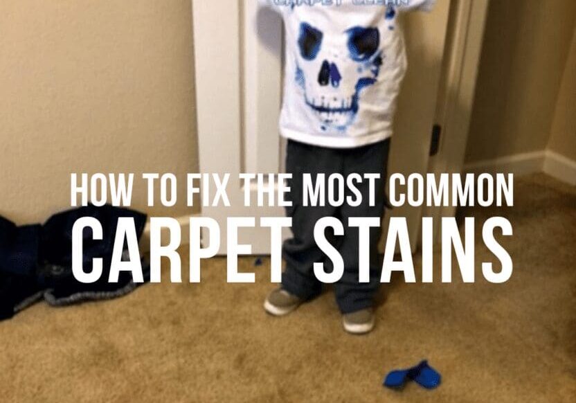 A boy standing in front of a carpet stain.