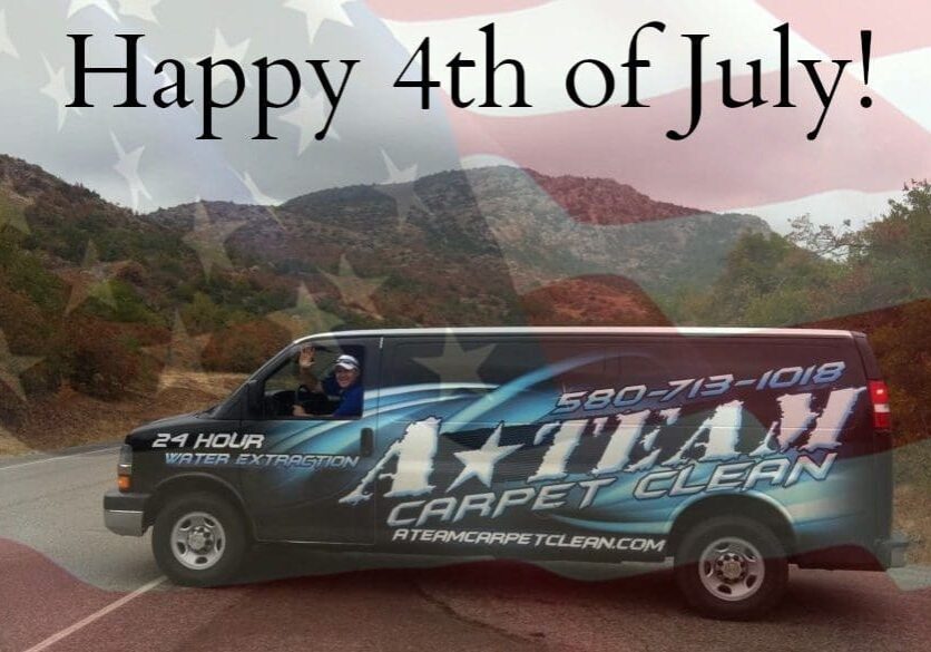 A van with the words happy 4 th of july written on it.